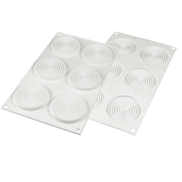 Tourbillon 28 silikonform från Silikomart. Silikonmatta med 6 formar per matta. Mattans storlek: 300 mm X 175 mm X 32 mm Formarna: 75 mm i diameter och 8 mm hög och rymmer 28 ml (totalt 168 ml)