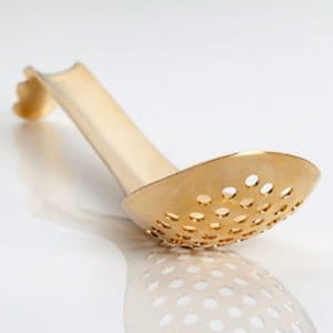 Perforerad sked i guld från 100%chef